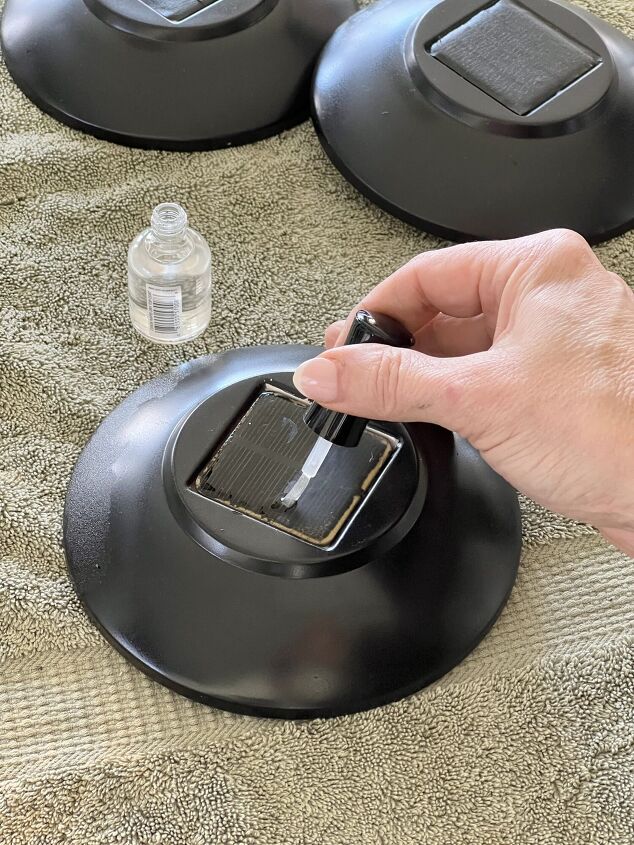 the best way to restore outdoor solar pathway lights, Brushing clear nail polish on to the solar light panel to restore the light s ability to gather and store energy