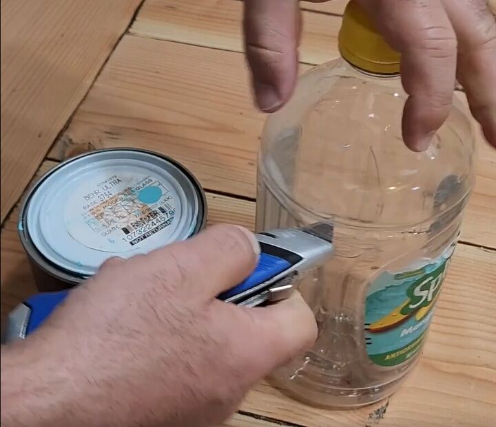 handyman tips 8 home improvement hacks to make your life easier, Cutting off the top of a plastic bottle using a utility knife