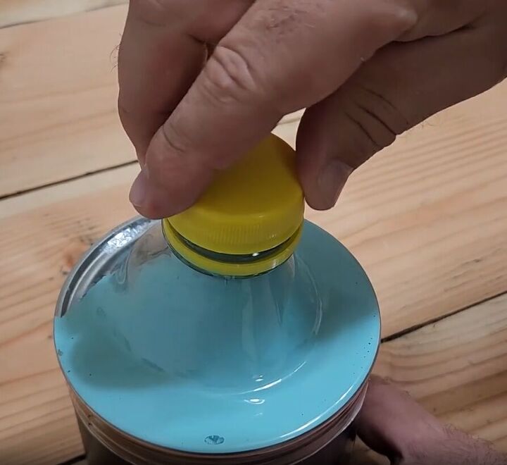 handyman tips 8 home improvement hacks to make your life easier, Screwing the lid back onto the bottle of paint