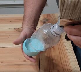 handyman tips 8 home improvement hacks to make your life easier, Attaching a plastic bottle filled with paint to a paintbrush