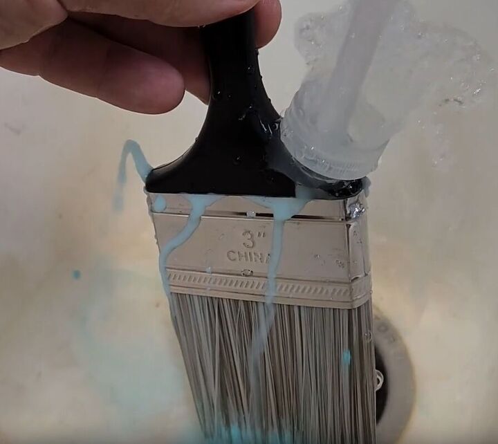 handyman tips 8 home improvement hacks to make your life easier, Cleaning a paintbrush under running water