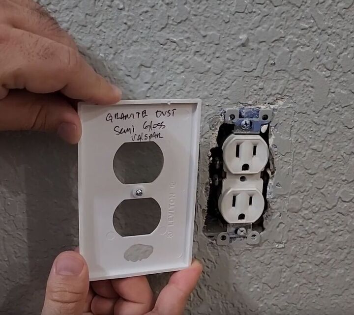 handyman tips 8 home improvement hacks to make your life easier, Outlet cover with paint details written on the inside panel
