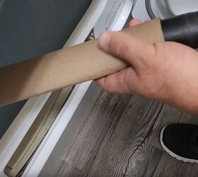 handyman tips 8 home improvement hacks to make your life easier, Attaching a paper towel tube to a vacuum cleaner