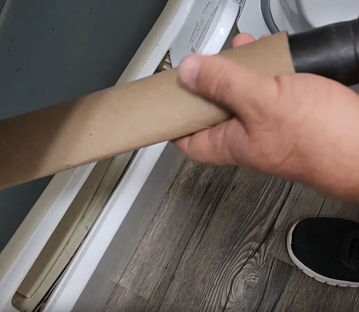 handyman tips 8 home improvement hacks to make your life easier, Attaching a paper towel tube to a vacuum cleaner