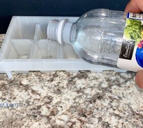 Pour white vinegar into an ice tray to copy this super quick, $2 cleaning hack