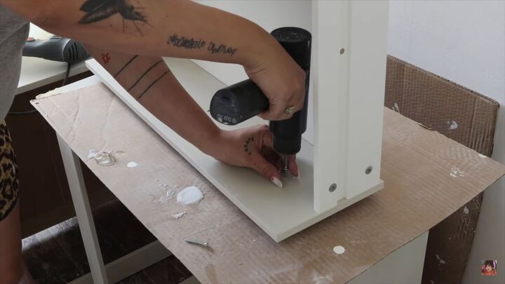 how to do a chic ikea nightstand makeover in 5 simple steps, Drilling holes for the screws