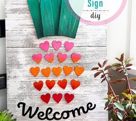 cartel de pia de bienvenida hecho con corazones de madera
