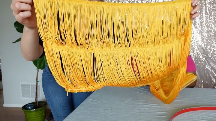 how to make a cute diy fringe lampshade in a few easy steps, Gold fringe up close