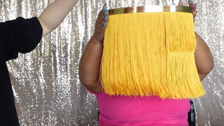 how to make a cute diy fringe lampshade in a few easy steps, Stripping the fringe