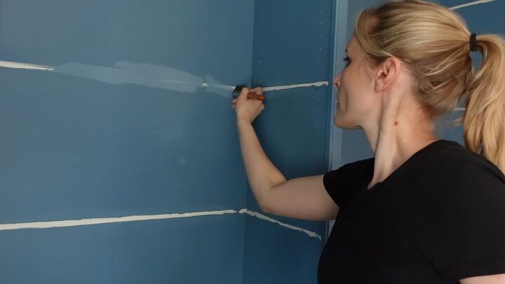 Painting the gaps left by the shelves