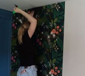 Trimming the wallpaper with a knife