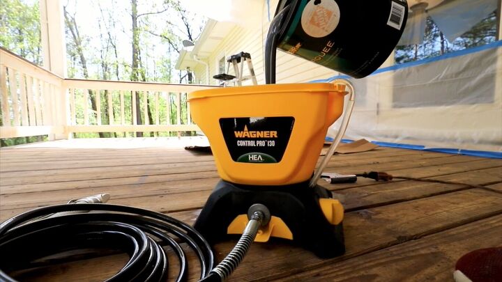 Staining a deck with sprayer