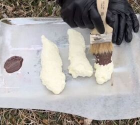 Create fake dog poop from spray foam and paint it