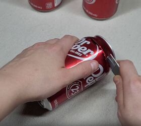 Cut the top of the can with a razor