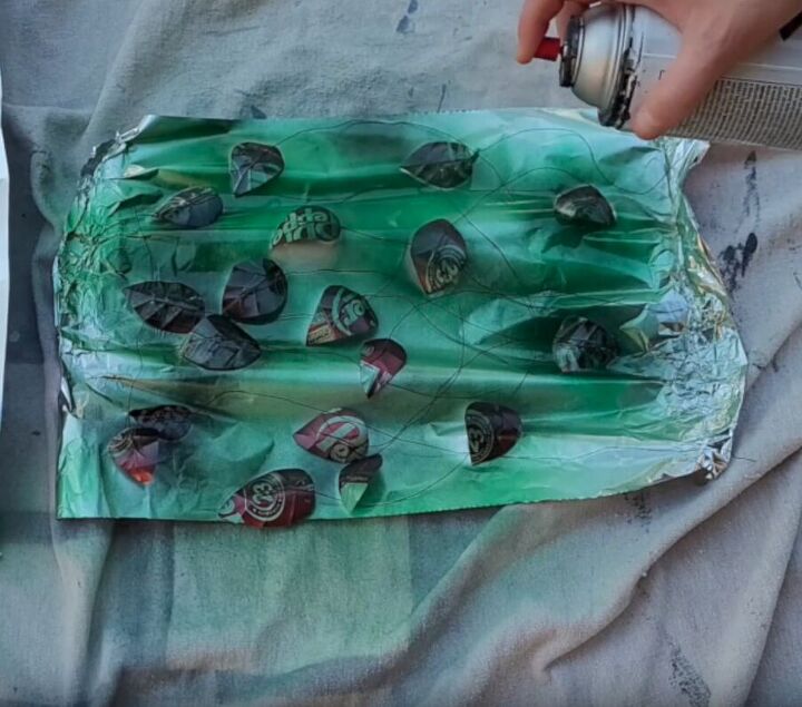 Spray painting the leaves with light green and black