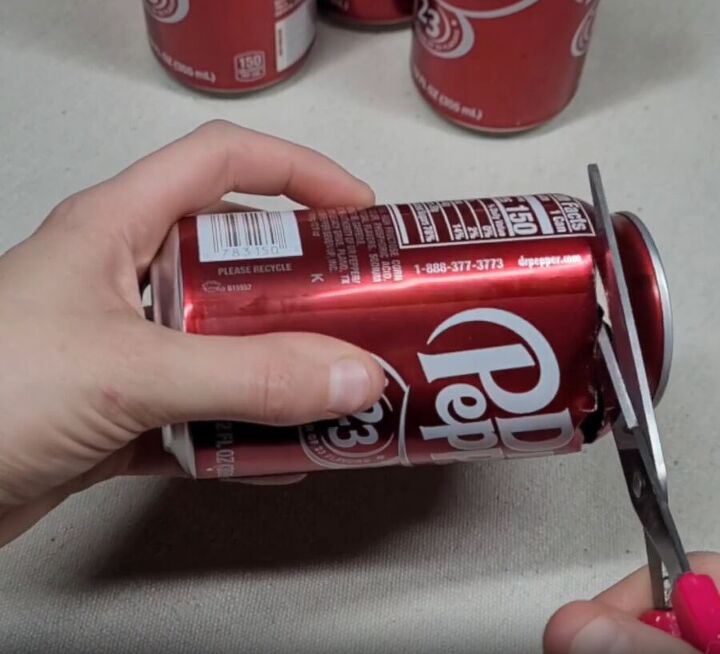 Continue cutting the top of the can with a scissors