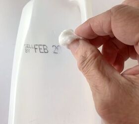 Inspired by West Elm, she cleaner her empty milk jugs and turned them into something beautiful