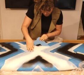 how to paint a surfboard with spray paint, Peeling off the painter s tape to reveal the painted surfboard design