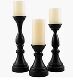one unpainted wooden candlestick