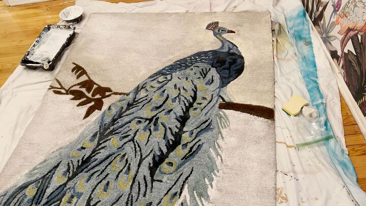 Peacock rug with white paint