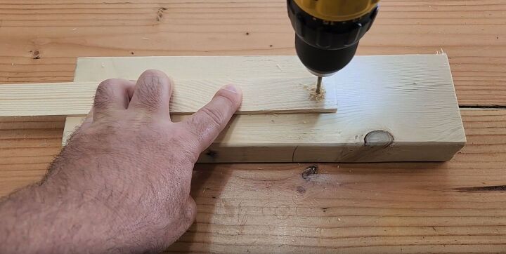 Preparing the shims: Drilling a hole through a wood shim
