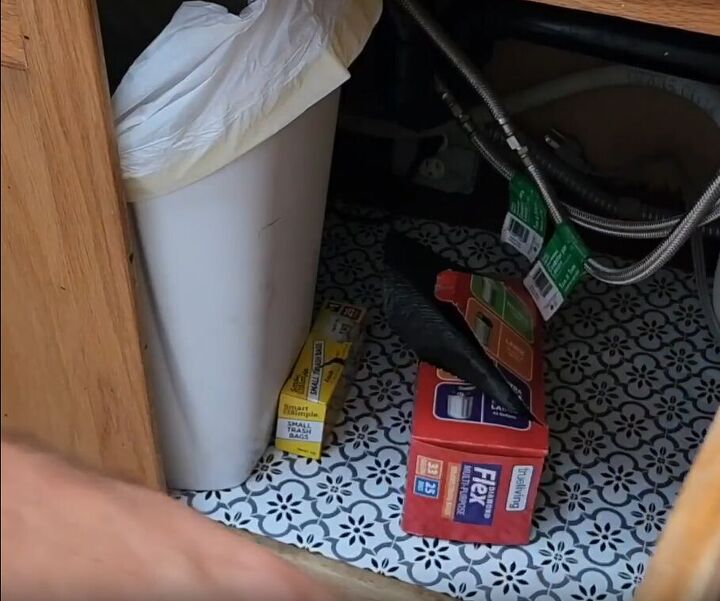 How to organize garbage bags under the sink