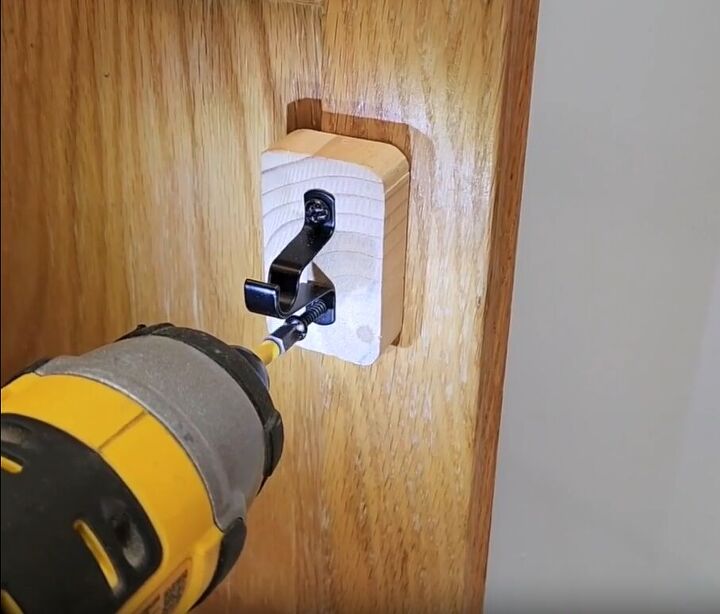 Installing brackets for under-sink storage