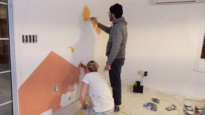 Painting a mural in the dining room