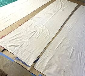 She hangs strips of drop cloth from her porch railing for this eye-catching patriotic idea