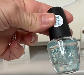 toilet cleaning hacks, Apply clear nail polish to seal toilet screws