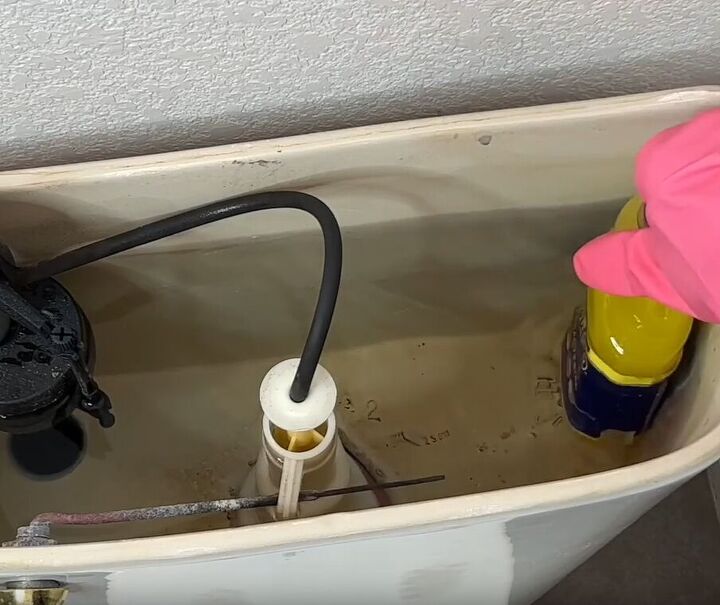 toilet cleaning hacks, Poke holes in a container to release antibacterial cleaner