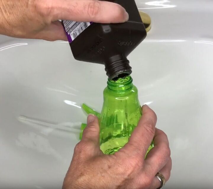 toilet cleaning hacks, Decant hydrogen peroxide into a spray bottle
