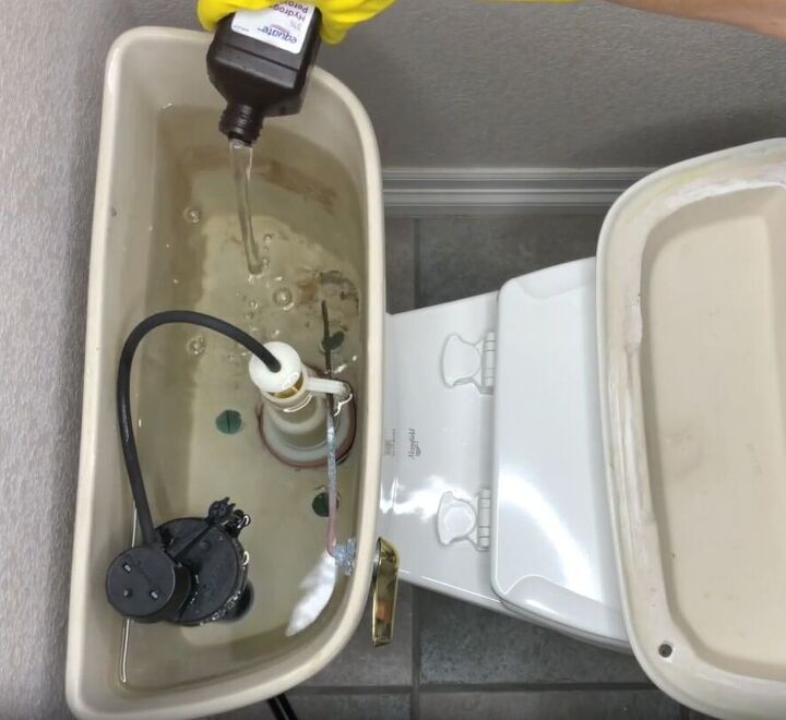 toilet cleaning hacks, Pour hydrogen peroxide into the toilet tank