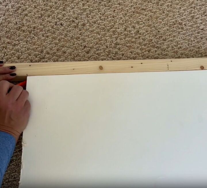 Attach two-by-twos to add length to the door