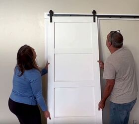 Hanging the transformed barn door in its new location