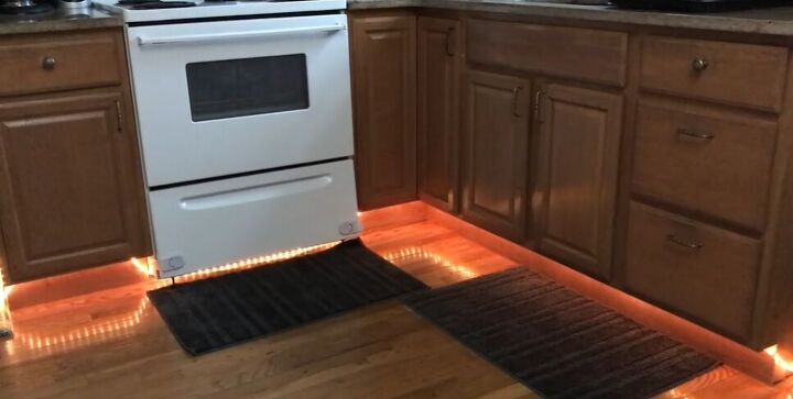 stick command hooks under your kitchen cabinets for genius lighting, DIY under cabinet lighting
