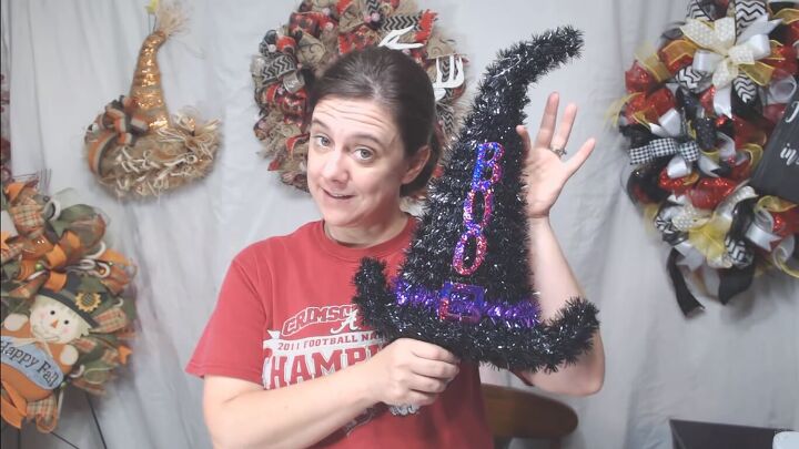 turn a simple dollar tree witch hat into a beautiful door hanger