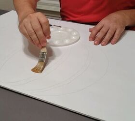 Applying clear glue with a large brush