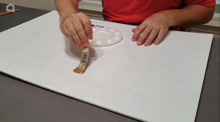 Applying clear glue with a large brush