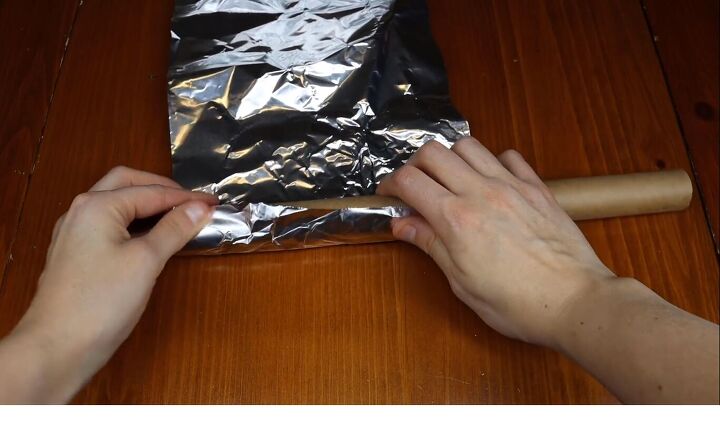 Rolling tin foil around a cardboard tube