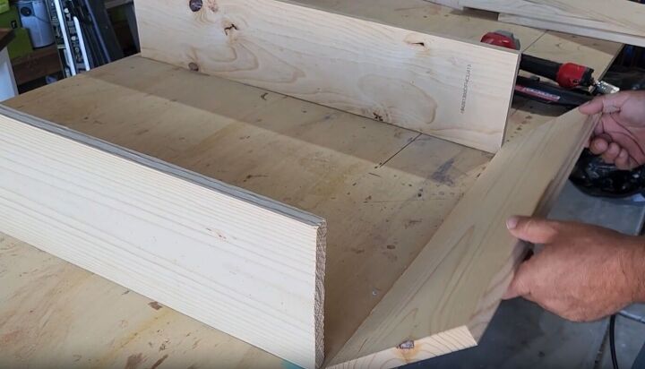 Attach a 24 inch board to the bottom of the two longer boards