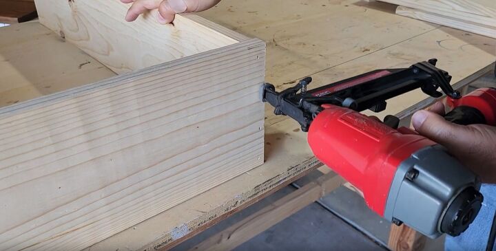 Attaching wooden boards together with a brad nailer