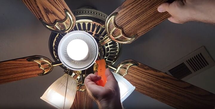 Use a screwdriver to remove the fan blades