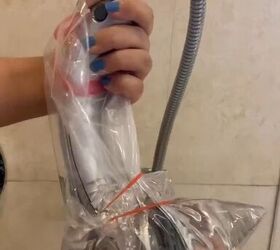 Wrapping the showerhead in vinegar