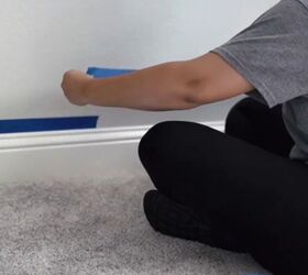 Preparing the wall with painter's tape