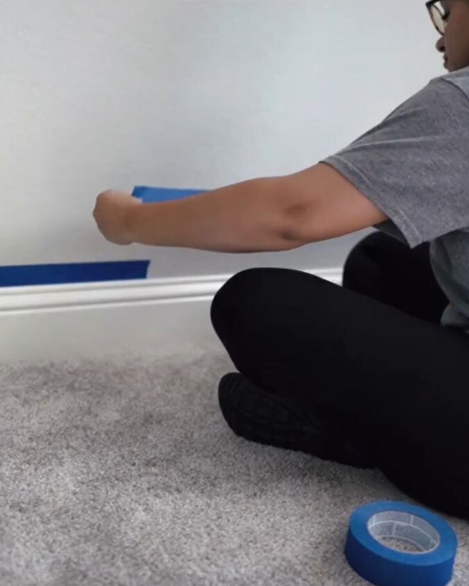 Preparing the wall with painter's tape