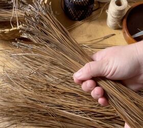 She grabs a handful of pine needles and ties them together for this lovely idea