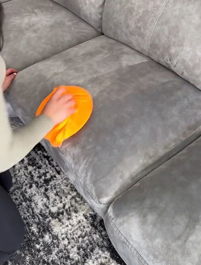 Scrubbing the sofa