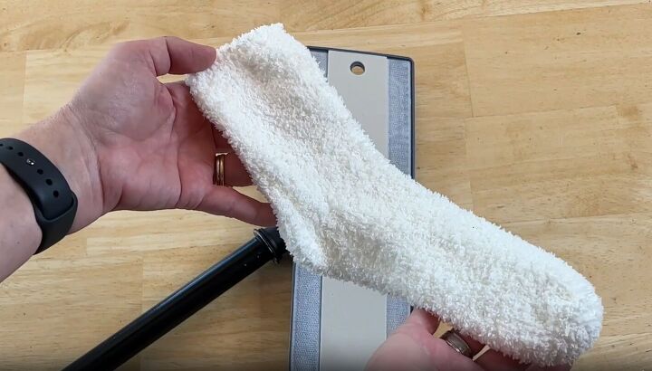 floor cleaning hacks, Place a sock on a swiffer