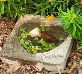 DIY de piedra de jardín con corazón de hormigón